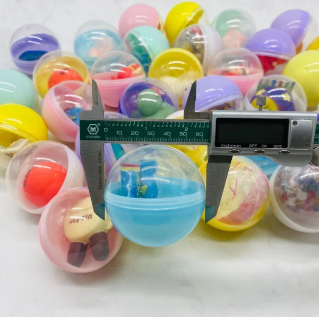 Cheap promotional gift capsule toy 65mm plastic surprise egg capsule ball toy vending machine ball for children