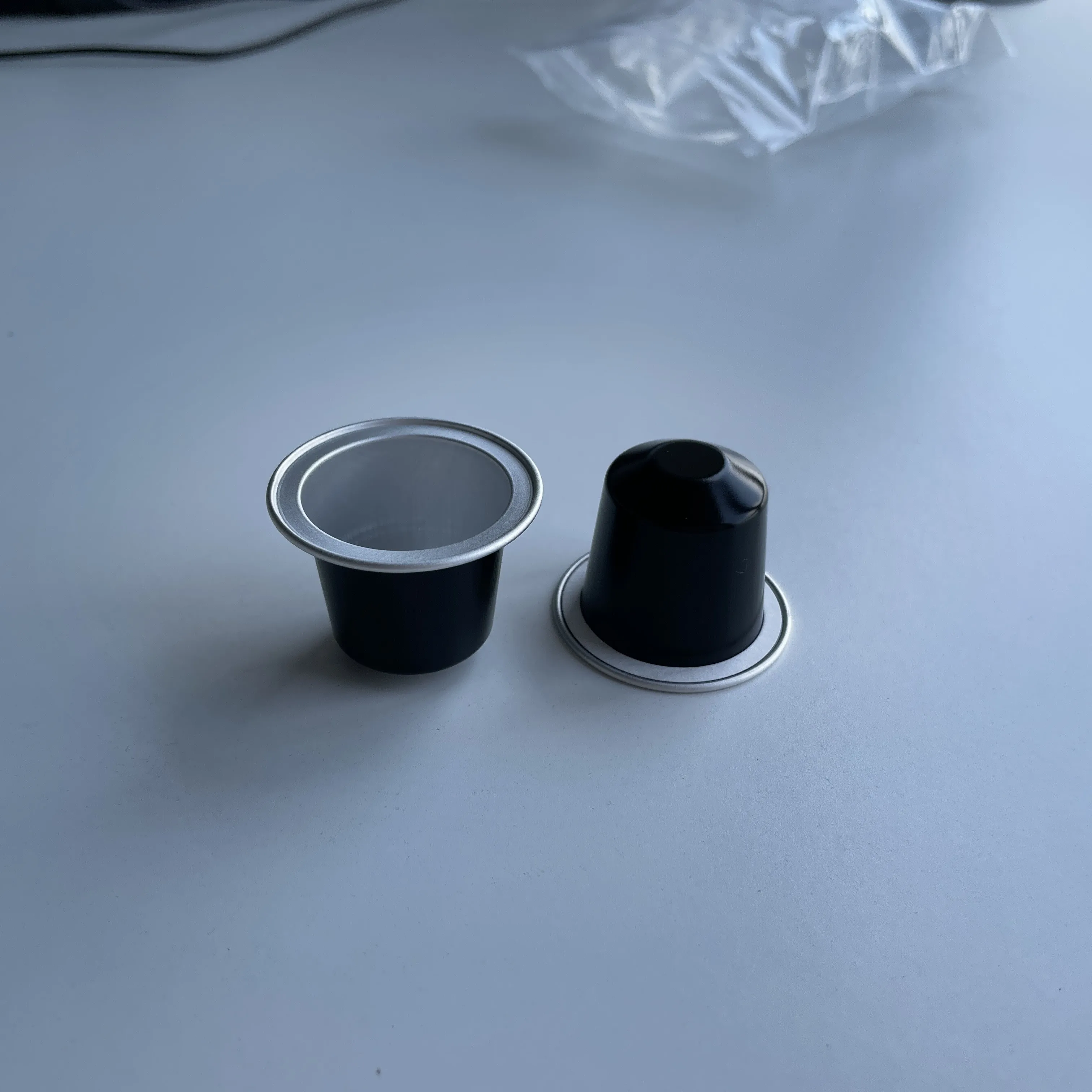 Empty Nespresso Aluminum Foil Coffee Capsule with black paper circle