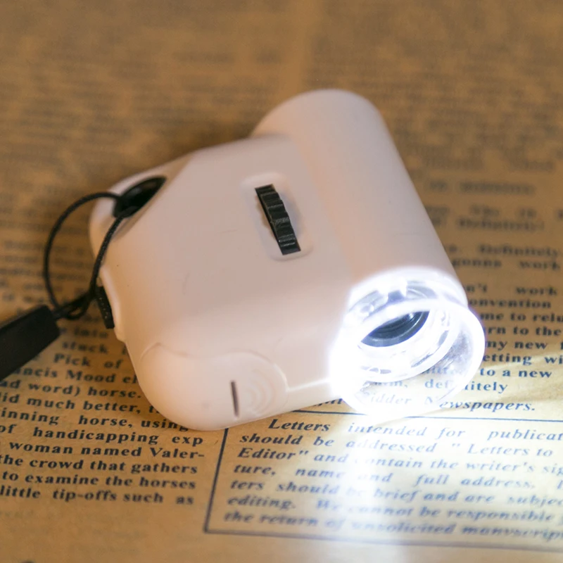 Mobile phone TH-7004C microscope 55 times with money check lamp magnifying glass wholesale jewelry mobile phone magnifying glass