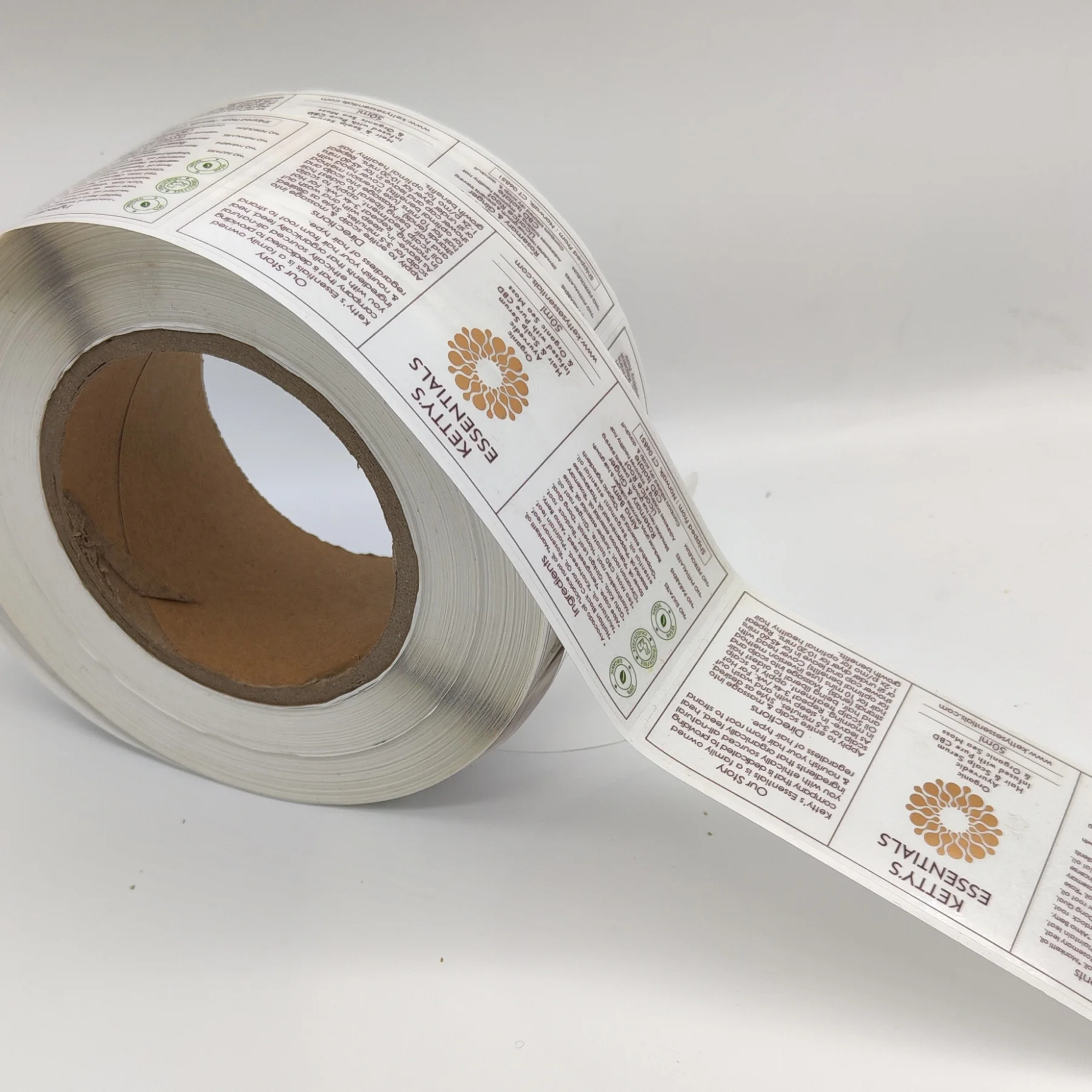 High Quality Custom Printed Waterproof PVC Self Adhesive Round packaging Hair Oil Bottle Labels sticker Printing on A Roll