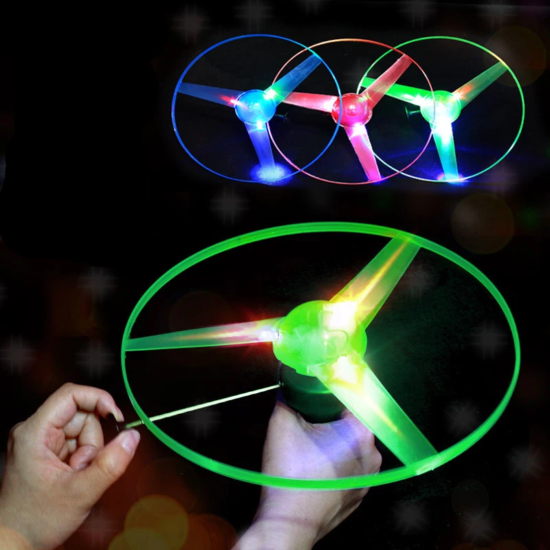 Popular Outdoor Funny Spinning Flyer Luminous Flying UFO LED Light Handle Flash Flying Toys for Kids Outdoor Game