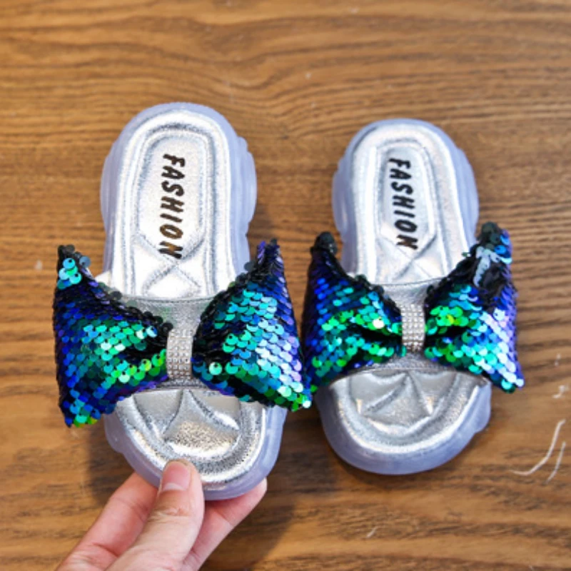 
Fashion Kids Girls Outdoor Glitter Bling Bow Slides Sandals Slippers Summer Soft PVC Jelly Slippers Shoes Manufacturer 
