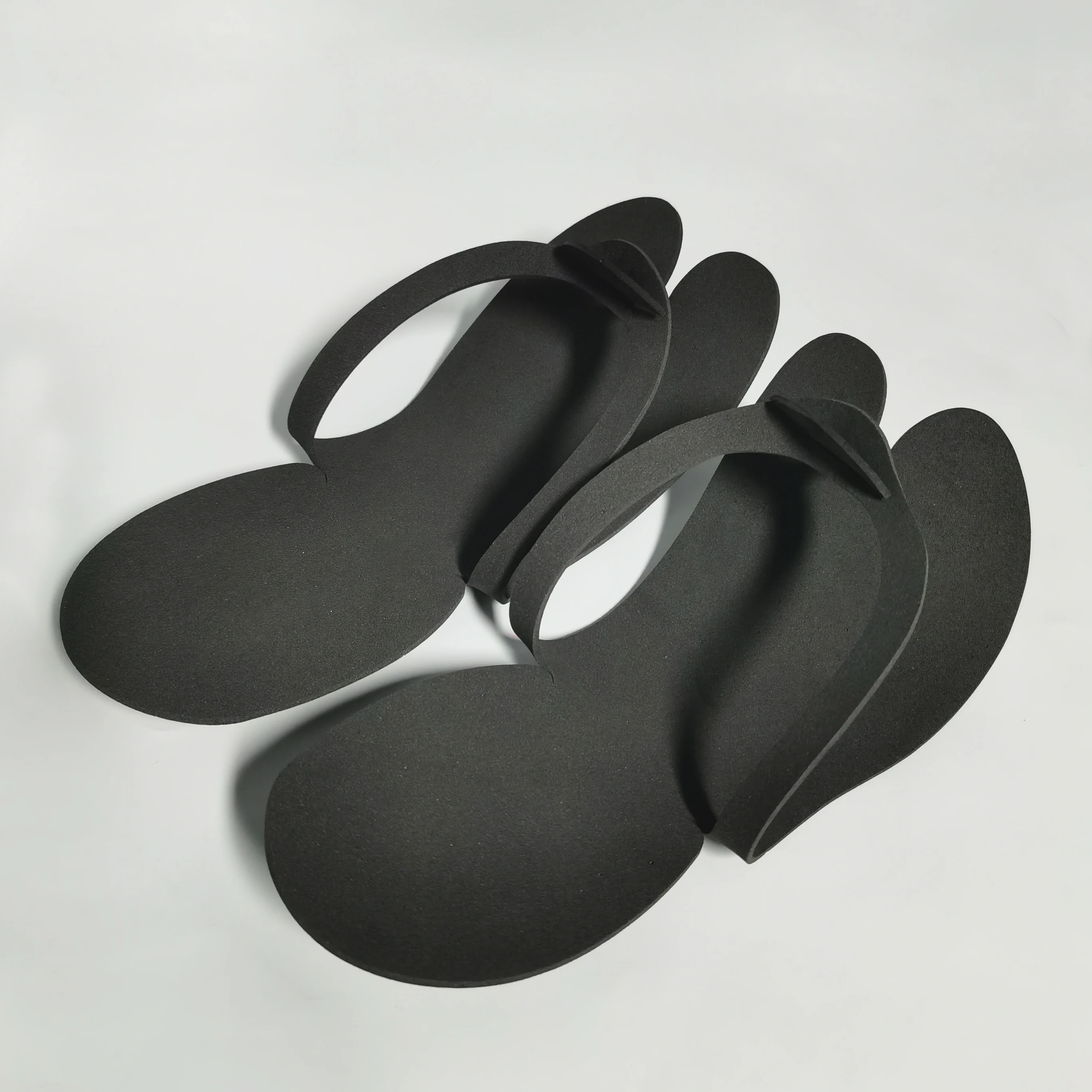 Фабричные одноразовые полиэтиленовые тапочки на заказ