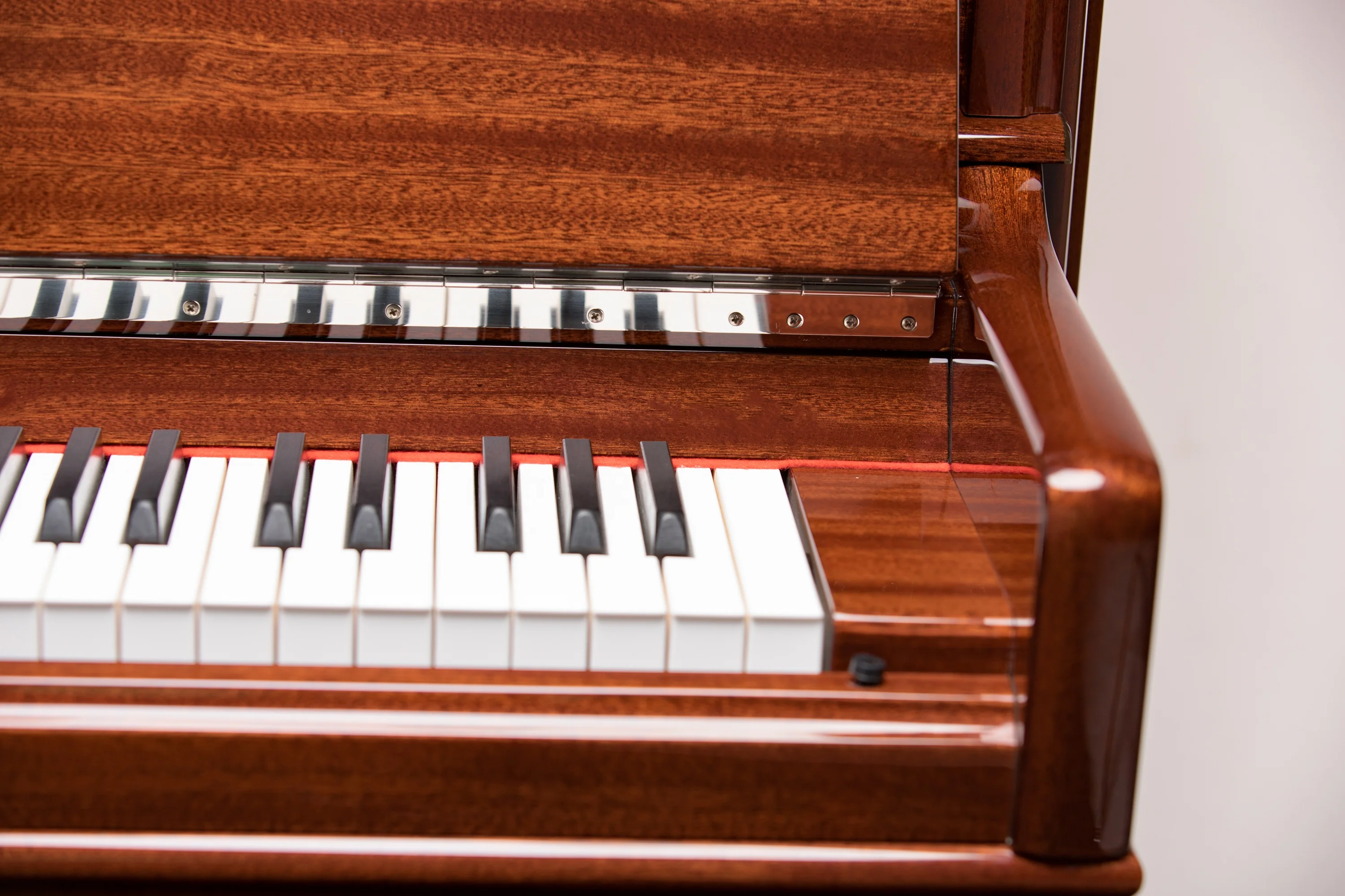 acoustic mahogany vertical piano
