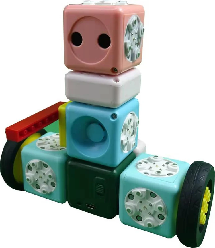 All That Wheels Moving and Turning Programmable Interactive Magnet Building Blocks