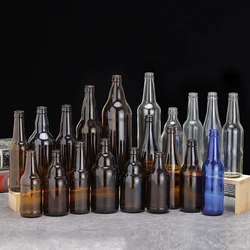 Factory Wholesale OEM Champagne Alcohol Whisky Drinking Liquid Beverage ES113 Empty Beer Bottles with Crown Cap