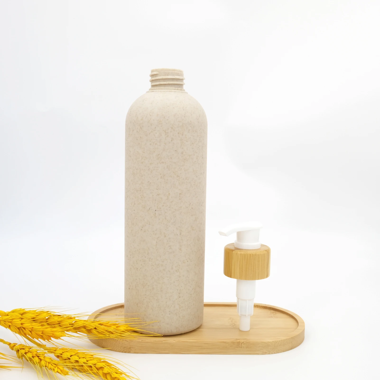 ECO Biodegradable 50ml 100ml 150ml 250ml 300ml 350ml 500ml HDPE Wheat Straw Lotion Empty Bottle with Bamboo Pump