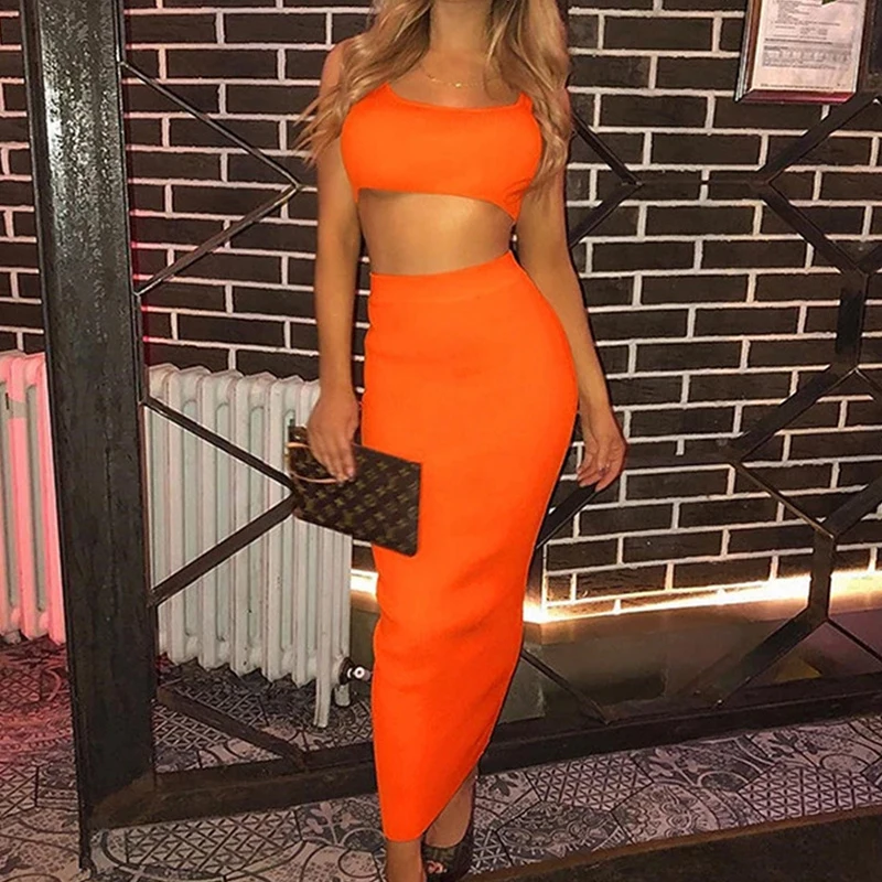 Summer solid color knitted suit crop top vest and high waist skirt two-piece women casual sexy tights set