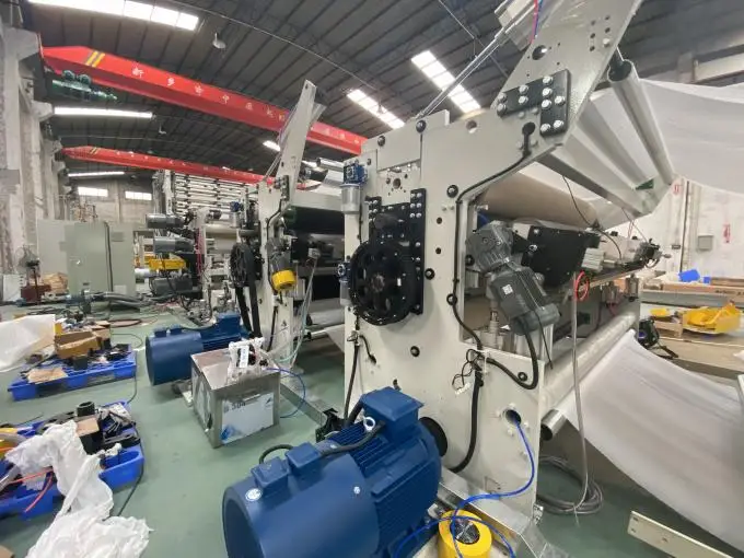 FEXIK 400-450m/min Speed Non-stop Perforating Toilet PaperConverting Machine Embossed Toilet Tissue Paper Roll Process Machine