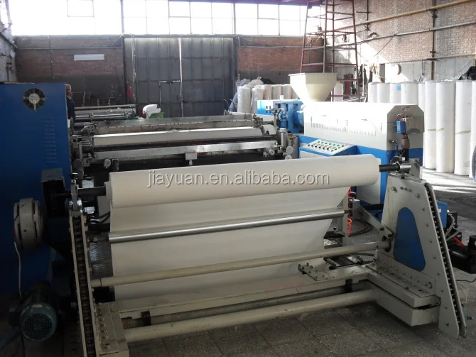 Porous elastic adhesive bandage coating machine
