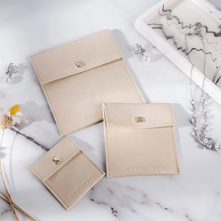 
Most popular products pu leather jewelry pouch with button and flap 