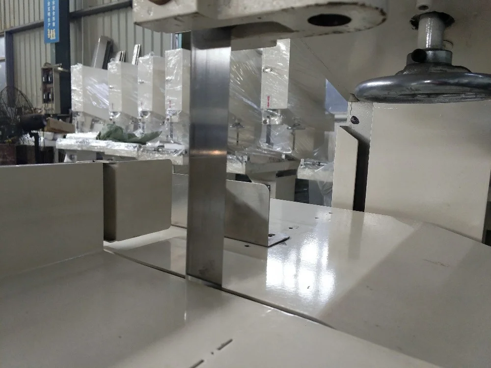 
Low cost paper machine toilet paper band saw cutter 