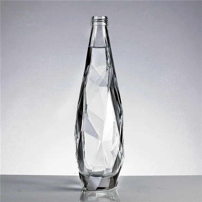 
wholesale diamond surface glass wine liquor bottle Glass brandy bottle with lid 