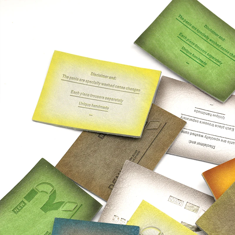 Wholesale Stylish Gradient Effect Washable Leather Patches With Design Metal Buckle Debossed Writing Men Jeans Leather Labels