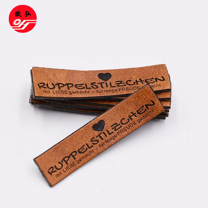 
Good Style Customized Debossed Brand Name Brown PU Leather Badge Patch for Clothing 