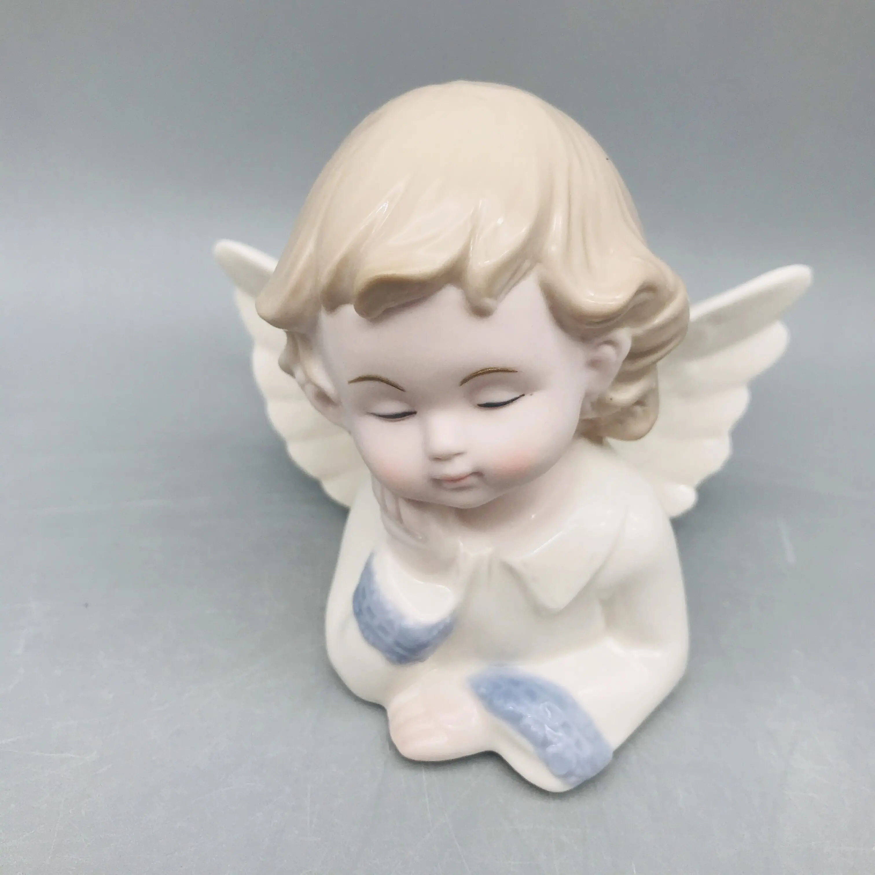 Factory directly supplies porcelain half-body angel figurine
