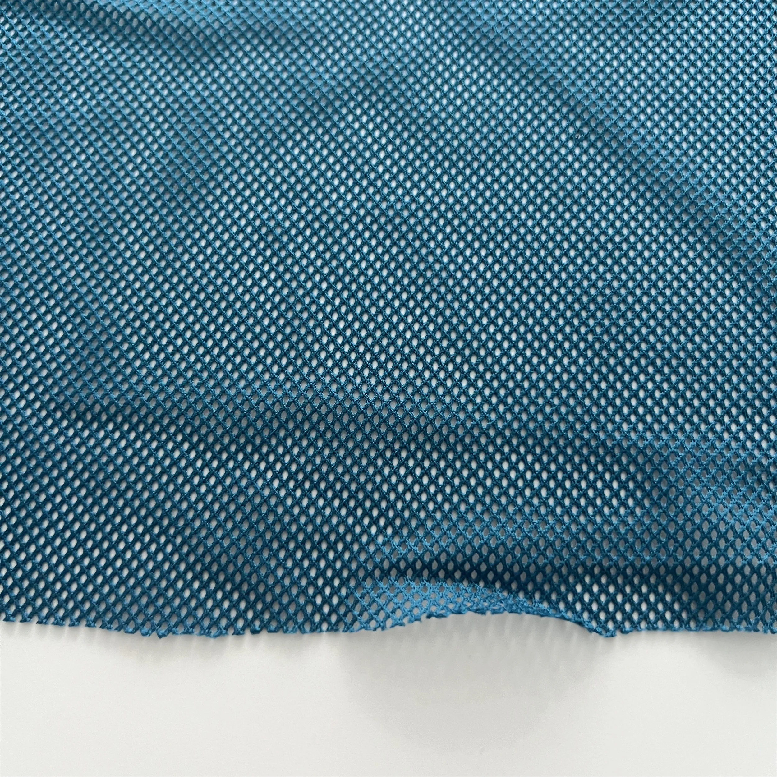 Low-elastic four-corner Tricot polyester mesh fabric Diamond mesh fabric Sportswear jacket lining fabric