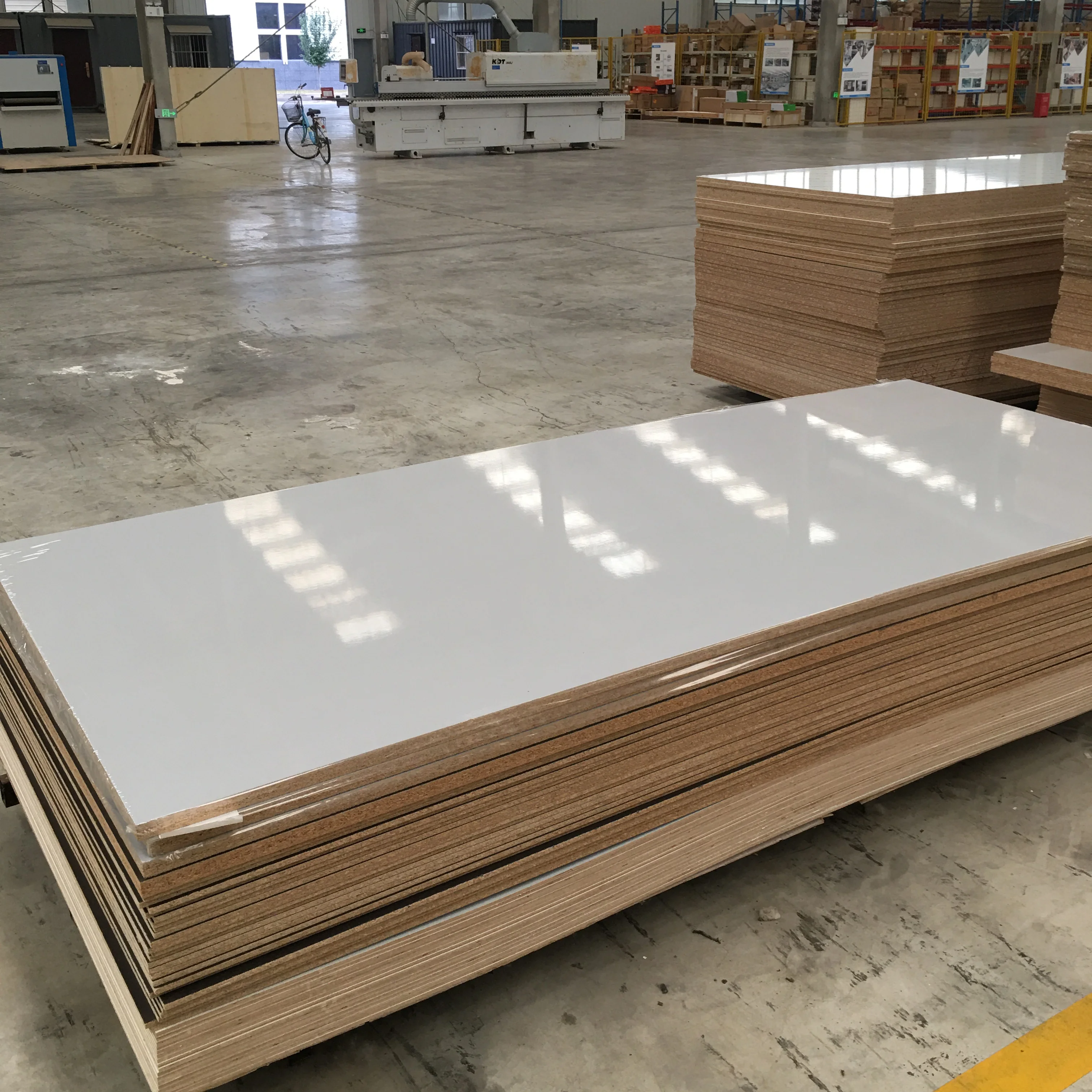 Sales E1 level 1220mmx2440mm  melamine faced high glossy uv mdf particle board