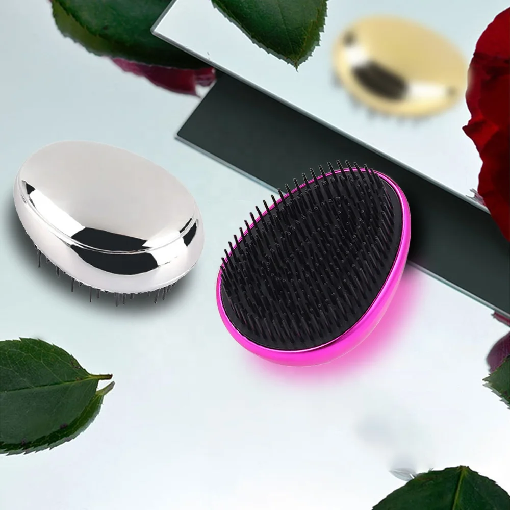 Electroplate paddle rose gold detangling hair brush