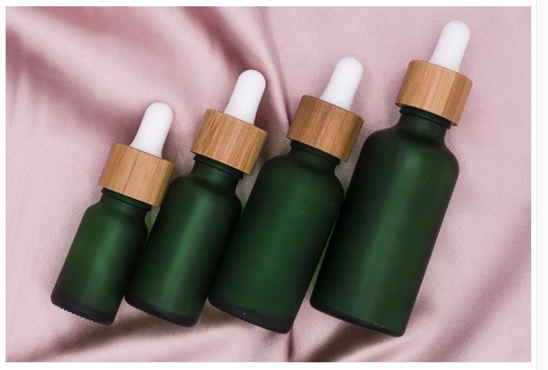 5ml 10ml 15ml 20ml 30ml 50ml 100ml Empty Frosted Green Blue Amber Clear Black Essential Oil Glass Dropper Bottle with Bamboo Lid