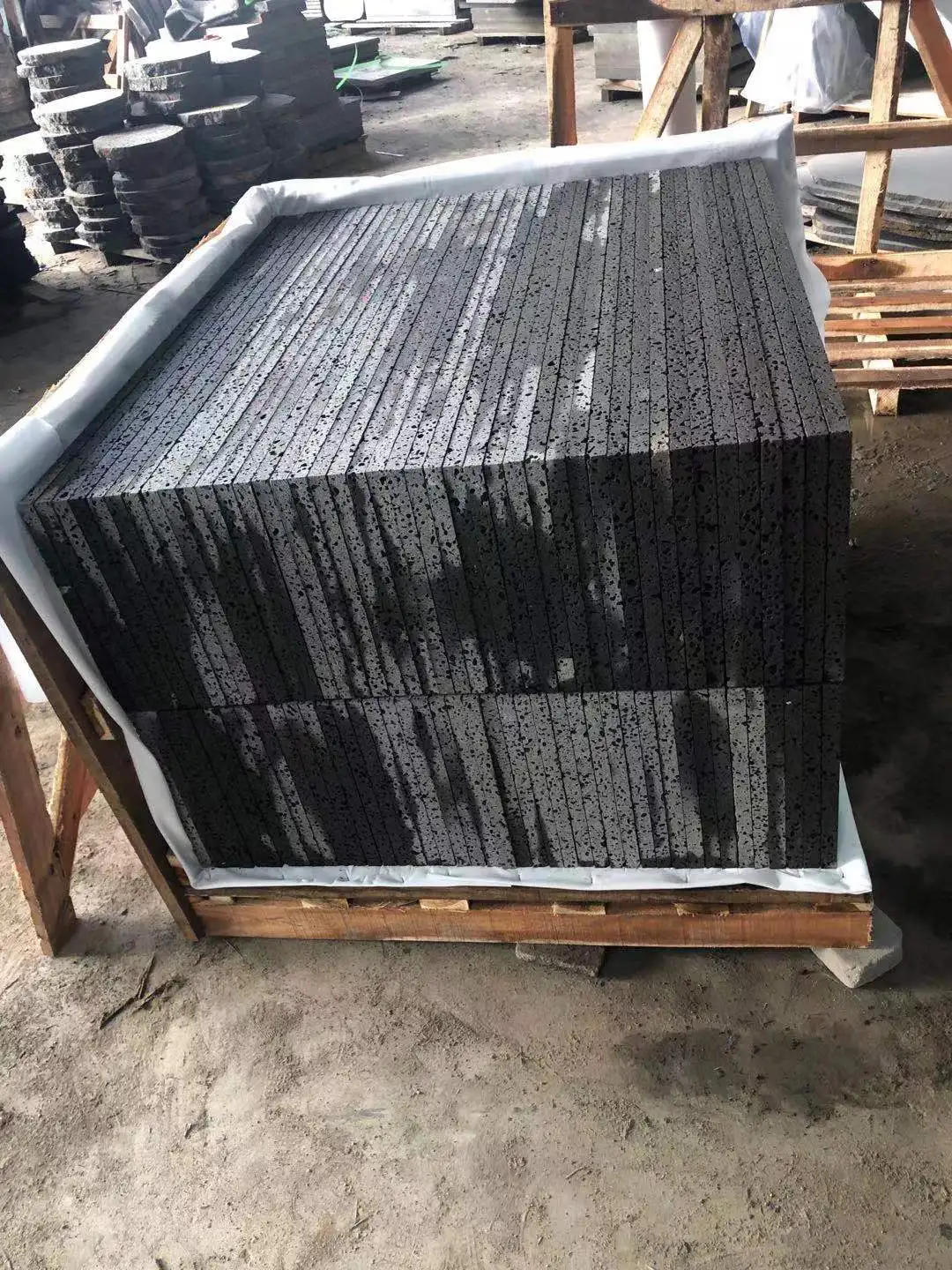 Customized Honed Finish Big Hole Type China Volcanic Black Basalt Lava Stone Slabs And Tiles