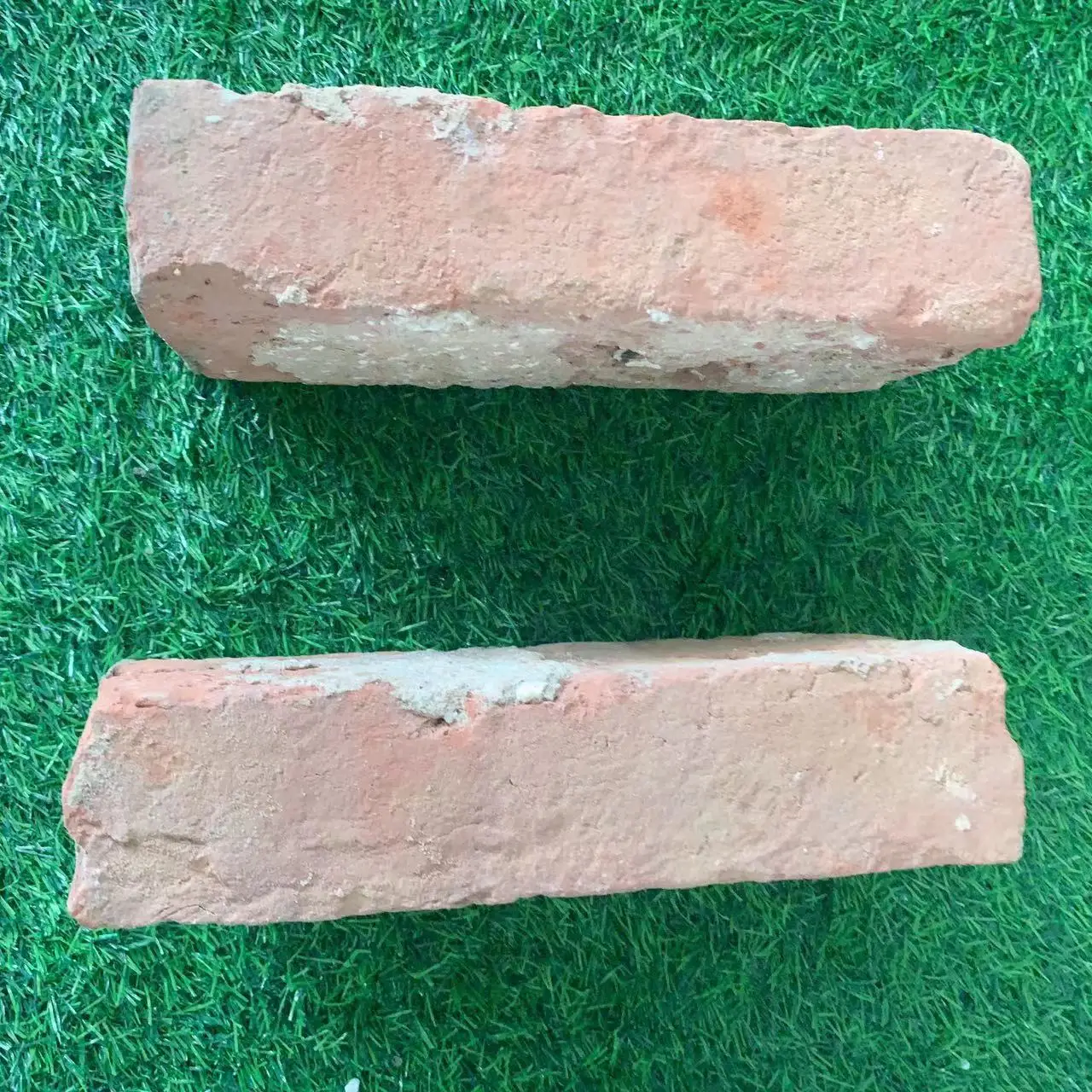 Old red recycled antique clay brick decorative brick building brick