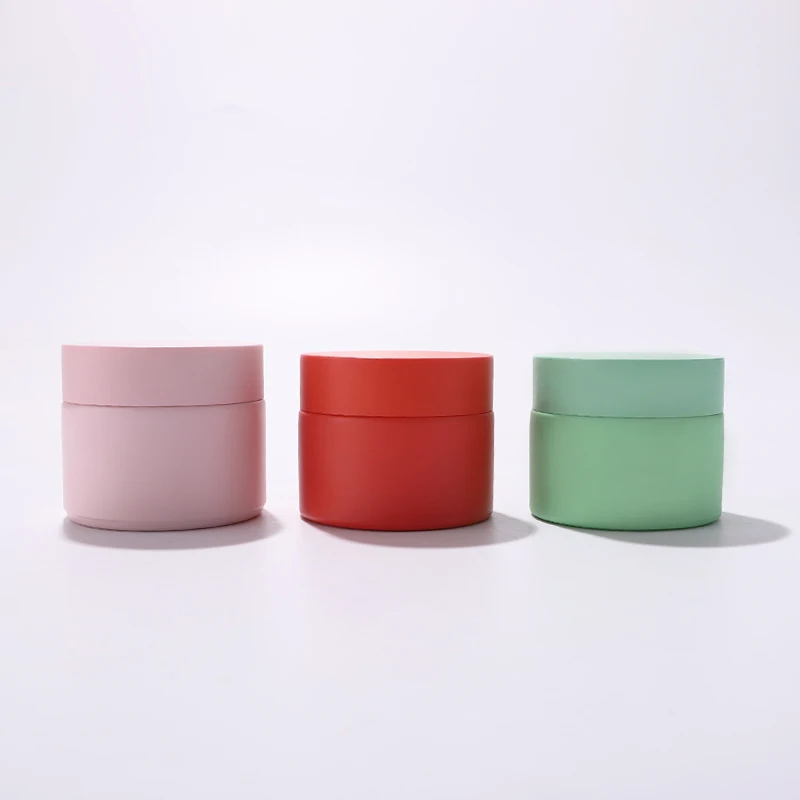 New design 50g customized color frosted cosmetic white ceramic jar packing with plastic cap for face cream eye cream for sale