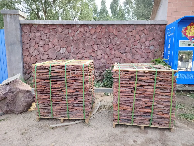 Natural red volcanic lava rock slate stone for pavement roads and wall cladding and floor patios loose lava stone slate