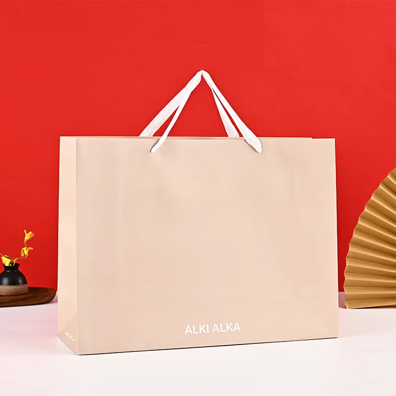 Роскошный брендовый подарочный бумажный пакет с логотипом под заказ для одежды матовая одежда бутиковые упаковочные сумки ручками HD Горячее тиснение