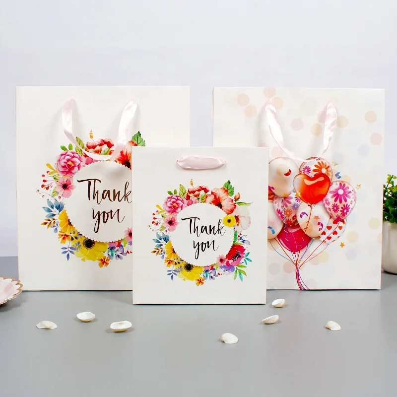 New boutique handbag bronzing craft gift bag  high-grade fancy white paper card fancy paper gift bag