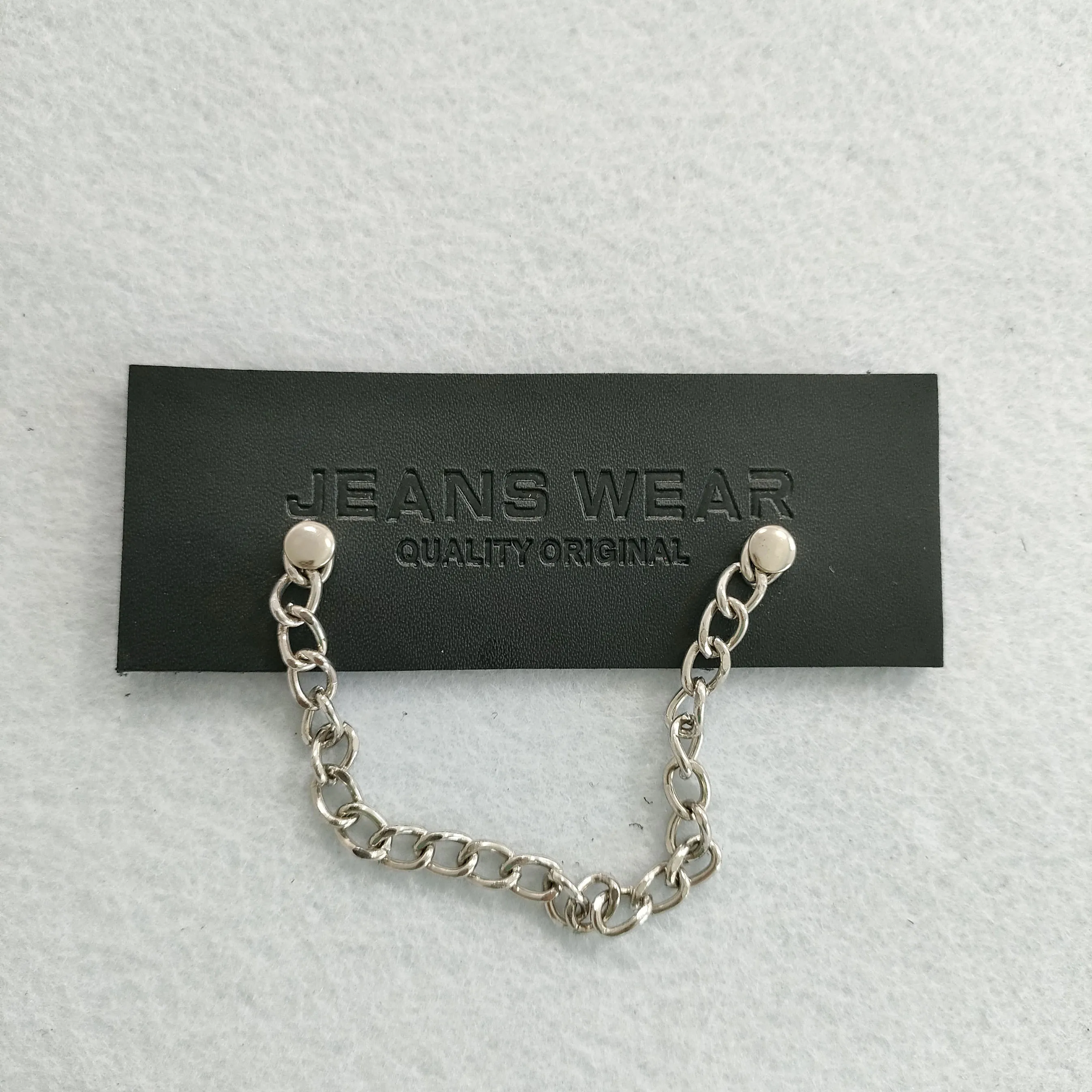 Factory custom black genuine leather embossed printed chain leather label