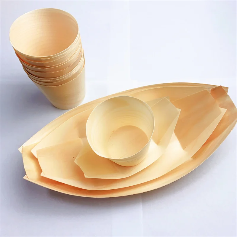 Eco-friendly disposable boat-shaped plates made from natural wood, safe and leak-proof.