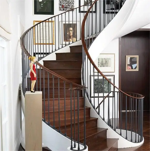 Foshan Customized Wrought Iron Arc Stairs Indoor Oak Wood Metal Design Wrought Iron Railing  Curved Staircase for Villa