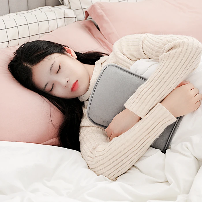 
Safety And High Quality Rechargeable Electric Hot Water Bag With Hand Pocket For Women Baby Use 