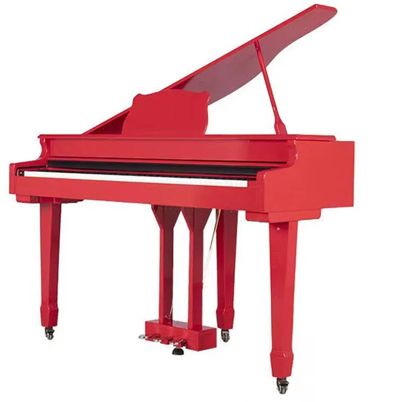 baby red grand piano with piano bench red