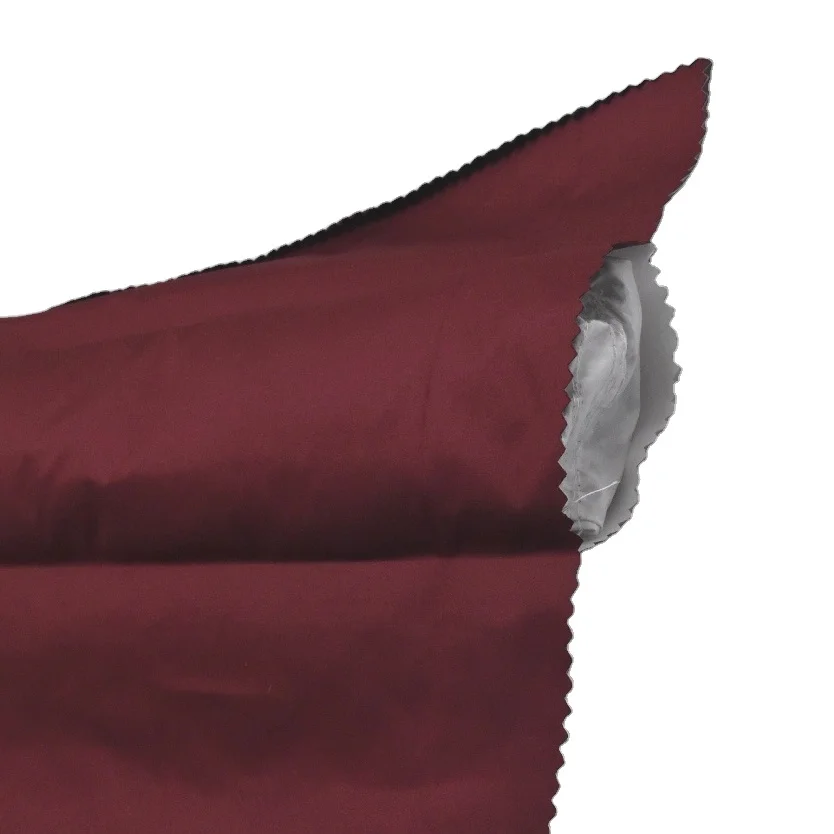 Directly filled down 100% polyester hot pressed seamless down jacket fabric