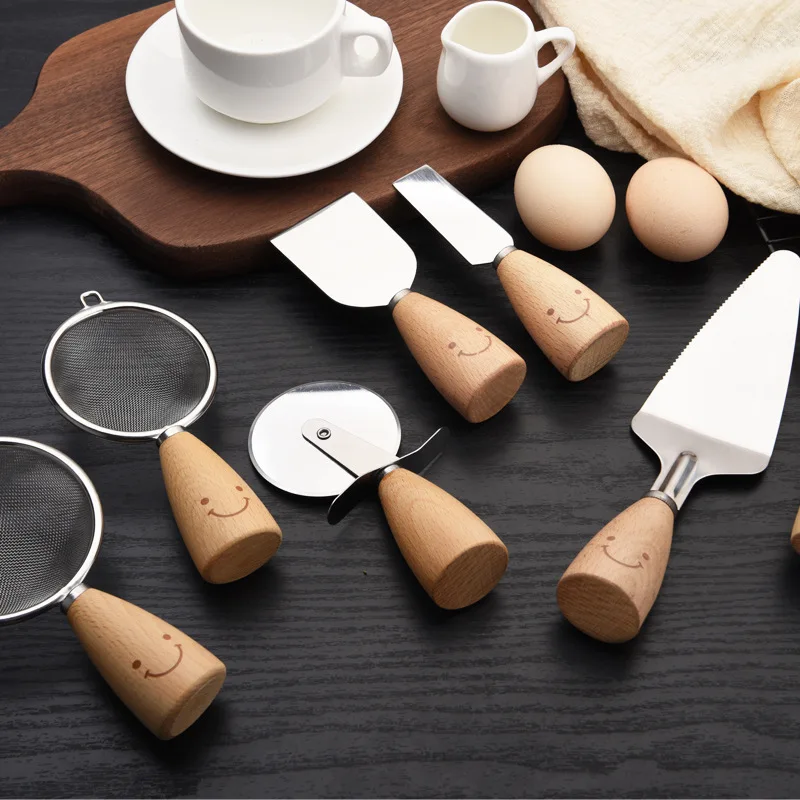 Factory direct selling kitchen gadget set wooden kitchen utensils creative smiling spoons forks and knives cake baking supplies