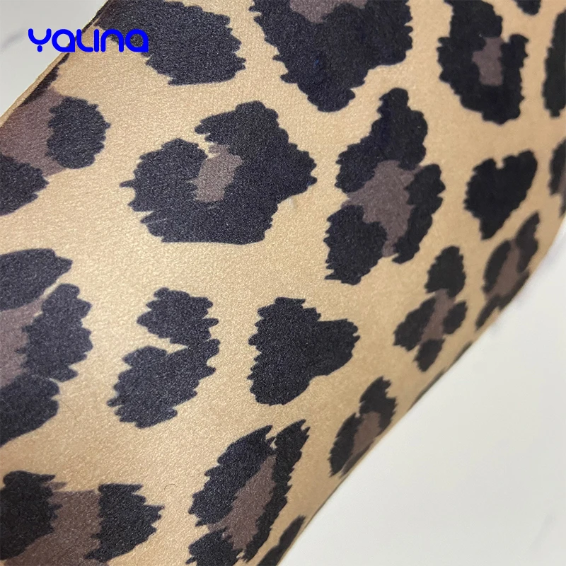 Reusable applicator glove evenly applies natural bronzed streak free appearance Leopard tanning mitt