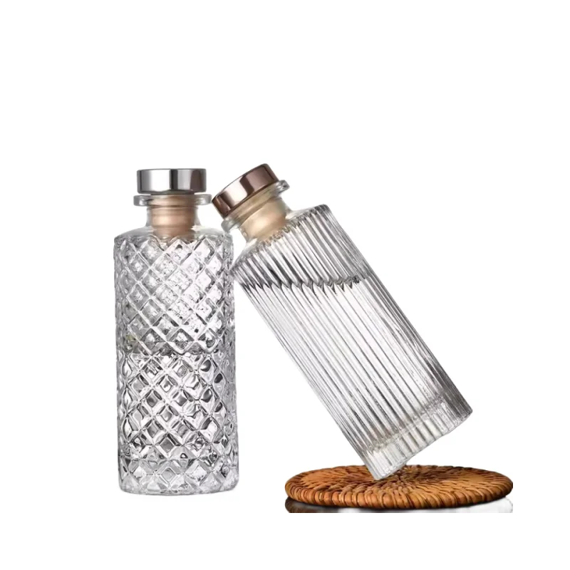 Wholesale150ml Unique Shaped Embossed Patterns Aroma Air Reed Diffuser Glass Bottle With Sticks