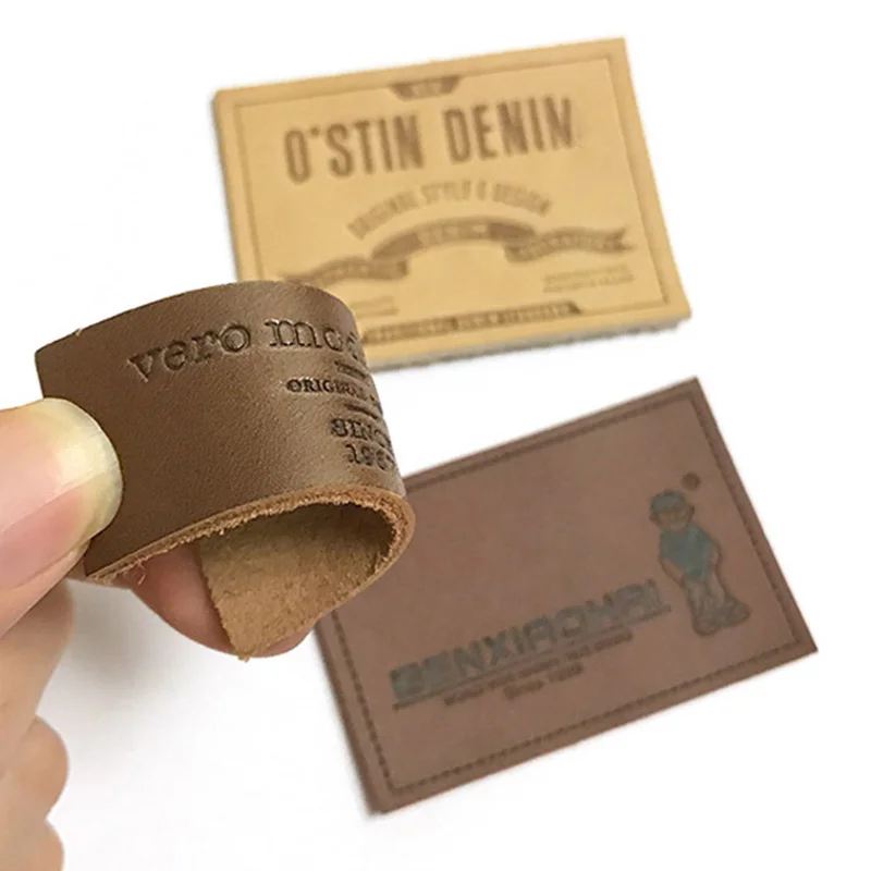 Manufacturer custom jeans embossed brand logo leather label for clothing accessories