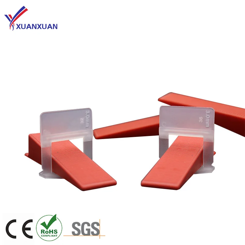 Tiling wedge system ceramic tile clips using tile leveling spacers