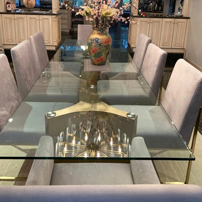 New design luxury furniture brass base dining table steel tempered glass dining tables with chairs sets
