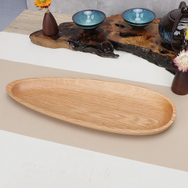 The snack tray of melon seed shaped white oak fruit plate is coated with food grade environment-friendly silicone coating