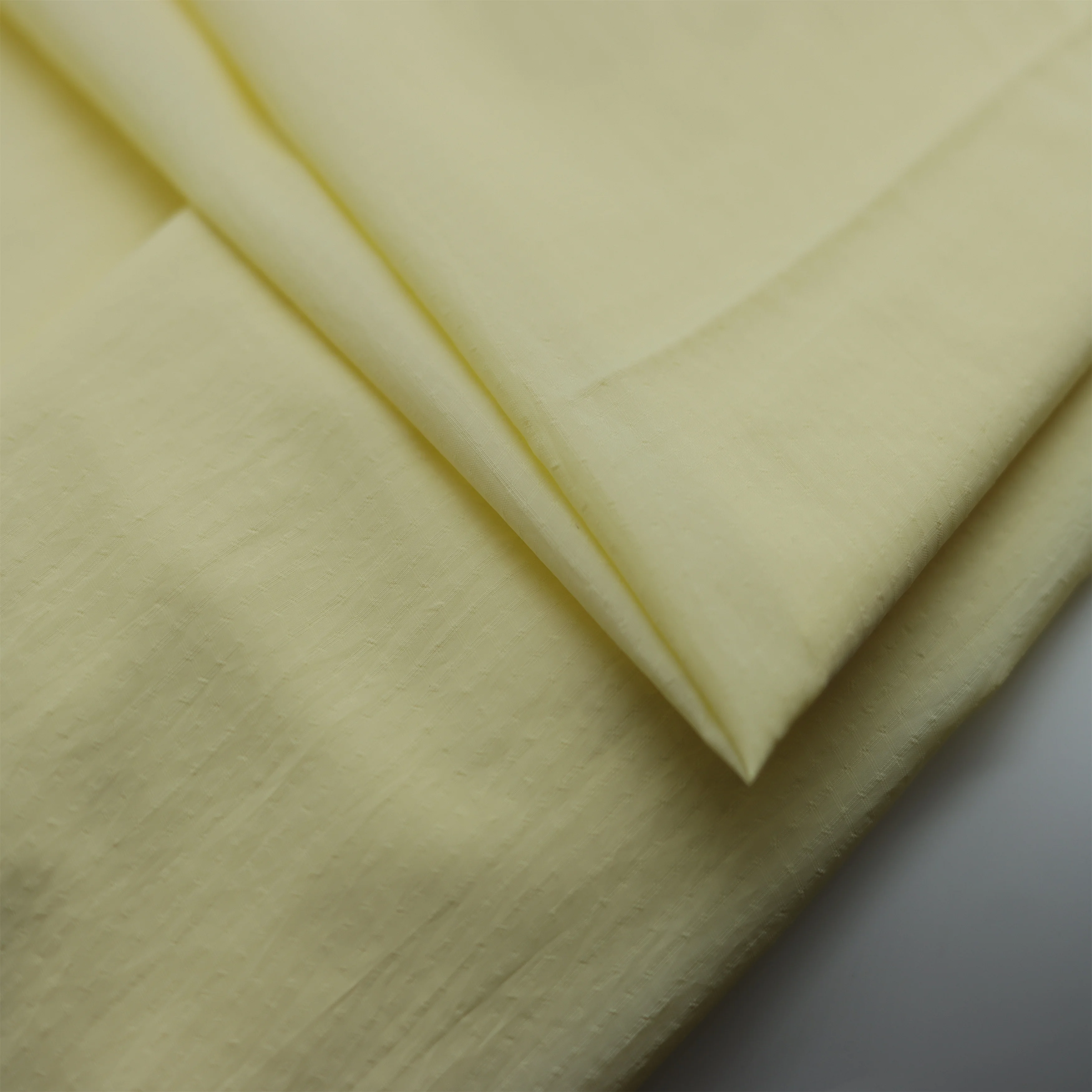 Wholesale Nylon fabric 20D grid recycled down jacket for jacket