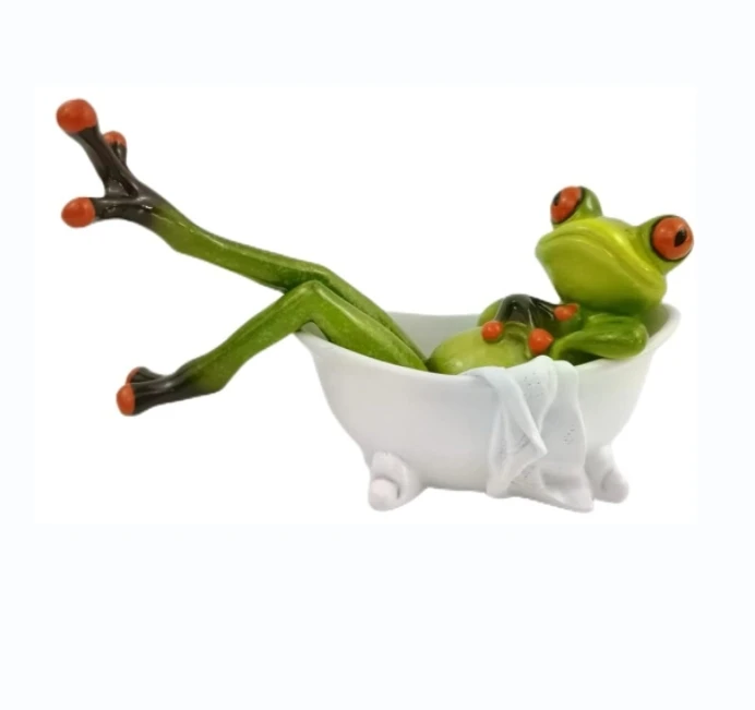 A resin frog lying in a bathtub statue is decorated with interesting creative craft. Resin frog sculpture