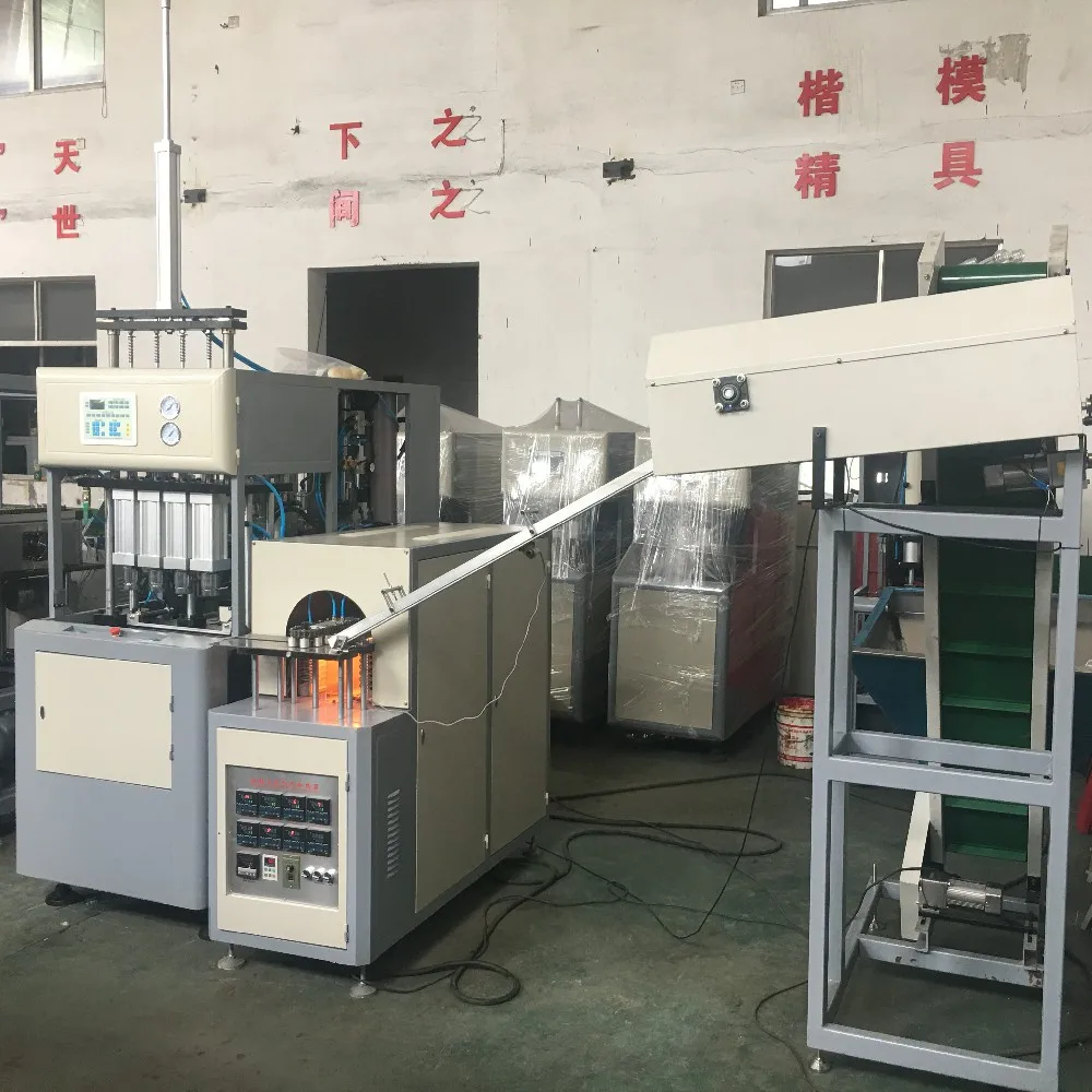 4cavity semi automatic PET bottle blowing machine price with preform autoloader