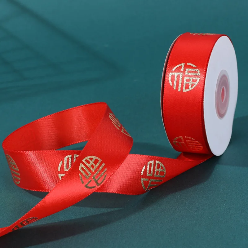 Wholesale 2.5cm Satin Red Ribbon Bow Pattern Rich Word Bronzing Home Housewarming Wedding Festive Occasions Roll Silk Ribbon