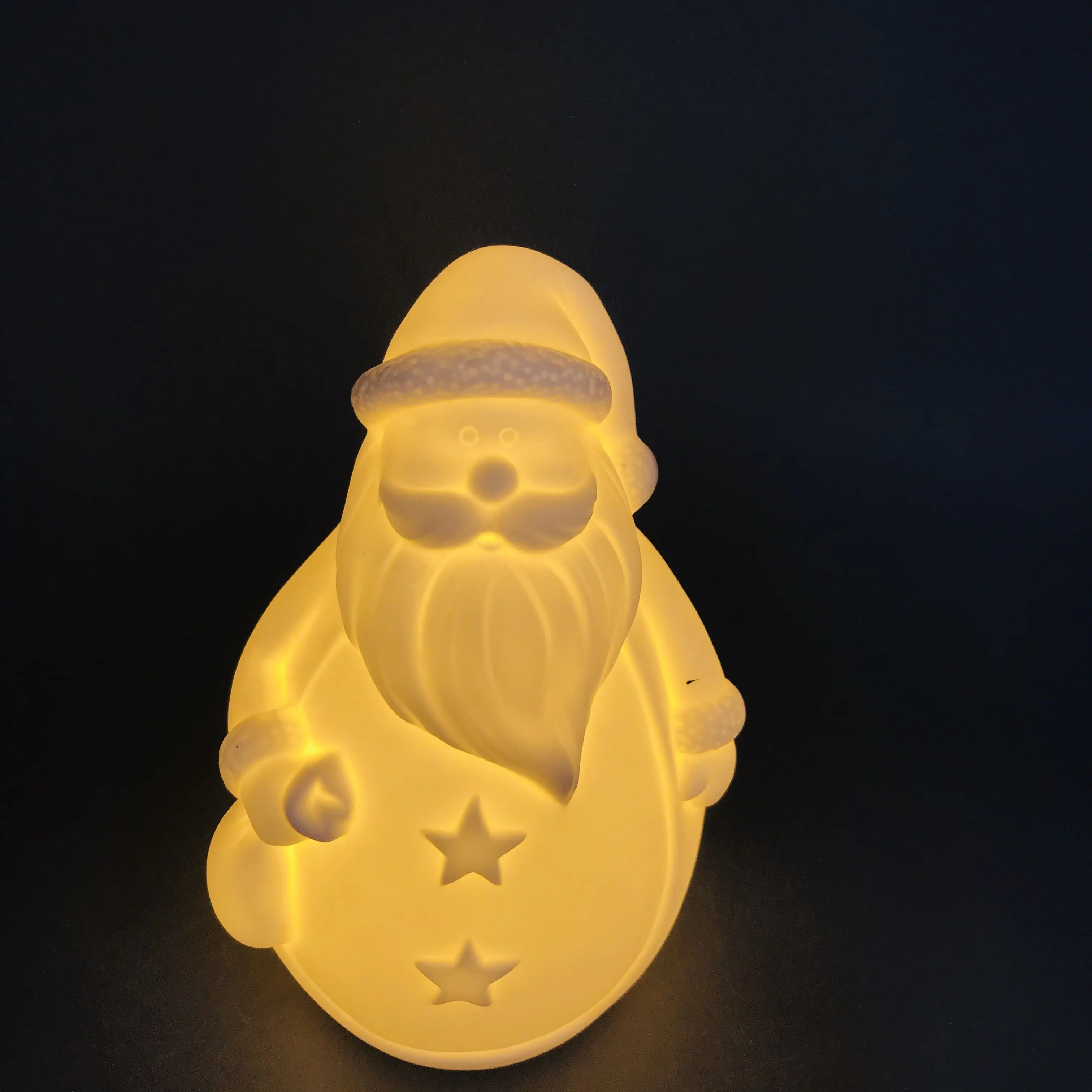 China factory cute design white porcelain santa clause with LED