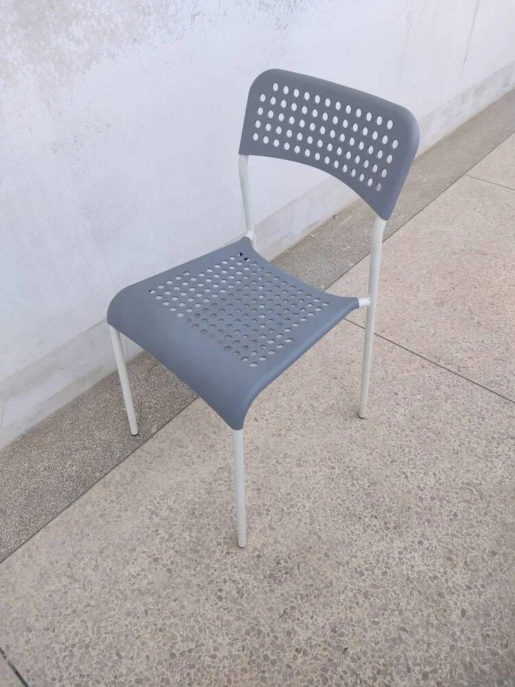 Fancy grey outdoor hotel banquet metal dining chair with holes