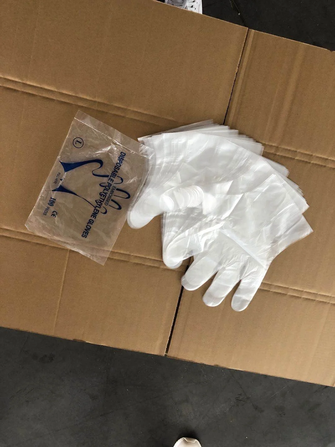 Factory wholesale PE Film single us gloves disposable long plastic gloves